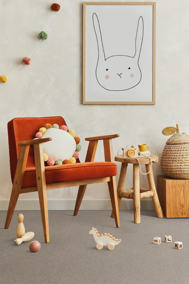 children's playroom with carpet flooring
